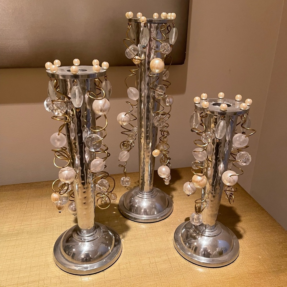 Vintage Artisan  3 piece silver plated candlesticks.